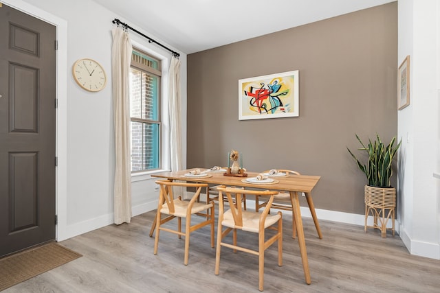 1065 Manacor Ln, Dallas, TX 75212 - dining area featuring plenty of natural light, light wood-style flooring, and baseboards