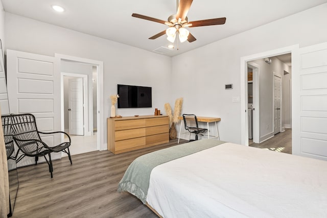 1065 Manacor Ln, Dallas, TX 75212 - bedroom with wood finished floors, recessed lighting, baseboards, and ceiling fan