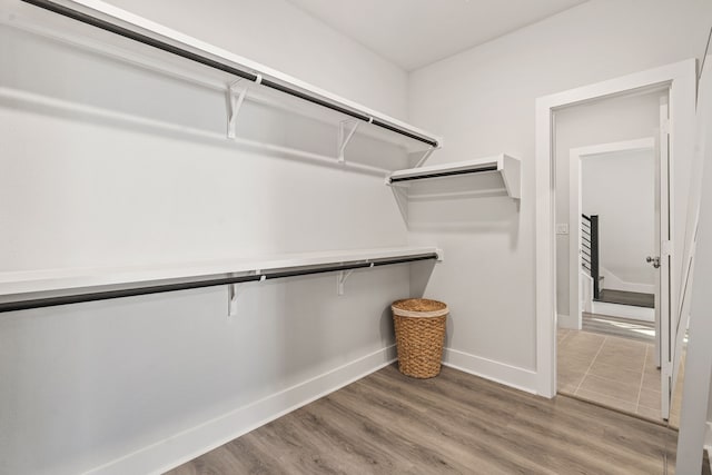 1065 Manacor Ln, Dallas, TX 75212 - spacious closet with wood finished floors