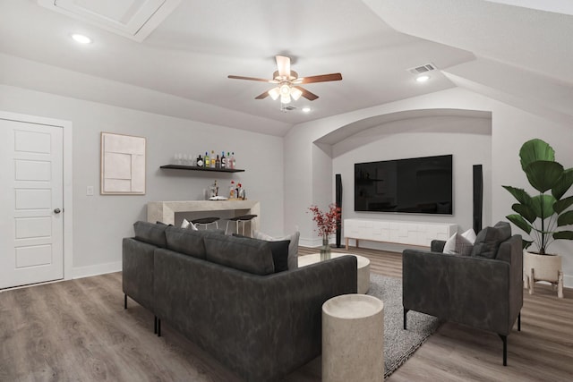 1065 Manacor Ln, Dallas, TX 75212 - living area with wood finished floors, ceiling fan, baseboards, and vaulted ceiling