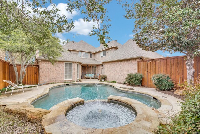 5709 Ridgehaven, Plano, TX 75093 - view of pool with a gate, a pool with connected hot tub, a patio area, a fenced backyard, and an outdoor living space