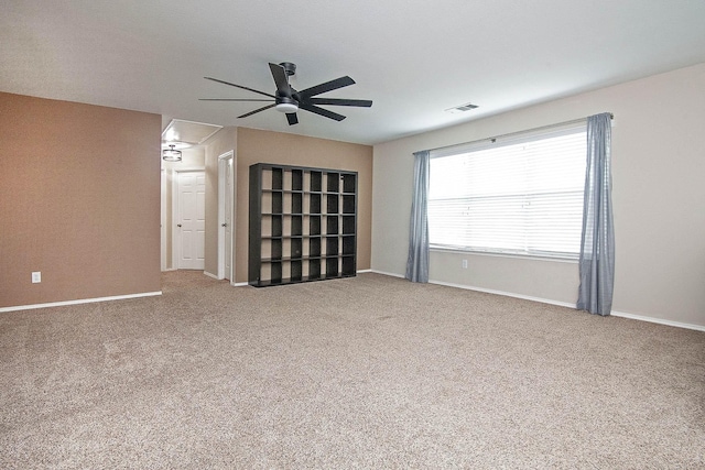 12073 Tyler Dr, Frisco, TX 75035 - carpeted spare room with attic access, ceiling fan, and baseboards