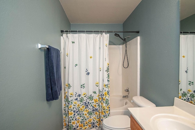 12073 Tyler Dr, Frisco, TX 75035 - full bath featuring vanity, toilet, a textured wall, and shower / bath combo with shower curtain