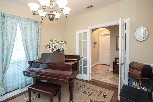 12073 Tyler Dr, Frisco, TX 75035 - sitting room featuring a chandelier and arched walkways