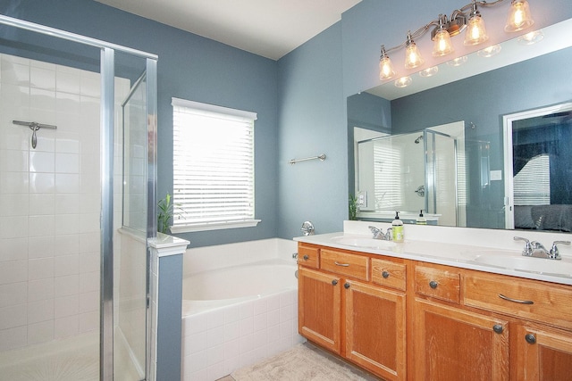 12073 Tyler Dr, Frisco, TX 75035 - bathroom with a shower stall, a garden tub, and double vanity