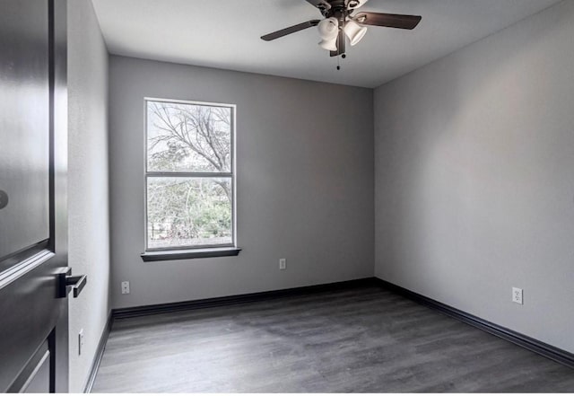 6609 Rockdale Rd, Fort Worth, TX 76134 - spare room featuring a ceiling fan, baseboards, and wood finished floors