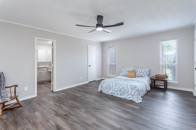 7 Harolds Cir, Richardson, TX 75081 - bedroom featuring dark wood-style floors, a textured ceiling, ornamental molding, a ceiling fan, and ensuite bath