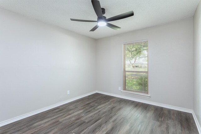 7 Harolds Cir, Richardson, TX 75081 - spare room featuring dark wood finished floors, ceiling fan, and a textured ceiling