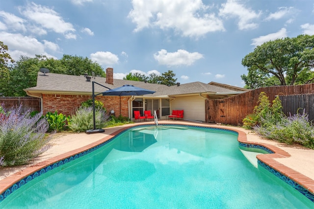 7 Harolds Cir, Richardson, TX 75081 - view of pool with a fenced backyard and a patio