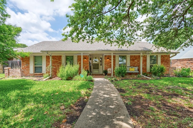 7 Harolds Cir, Richardson, TX 75081 - single story home with a porch, brick siding, and a shingled roof