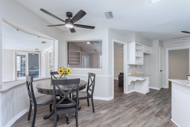 7 Harolds Cir, Richardson, TX 75081 - dining area with ceiling fan and dark wood finished floors