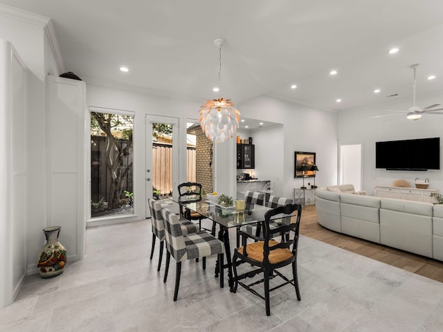 dining room featuring crown molding, ceiling fan with notable chandelier, and recessed lighting