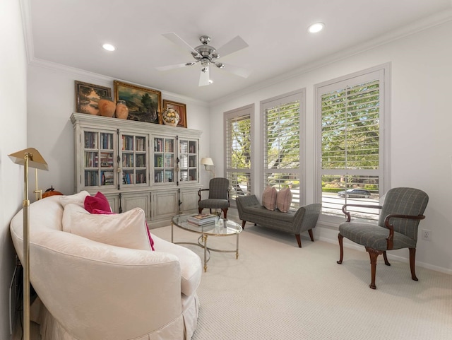 living area featuring crown molding, carpet, a ceiling fan, and recessed lighting