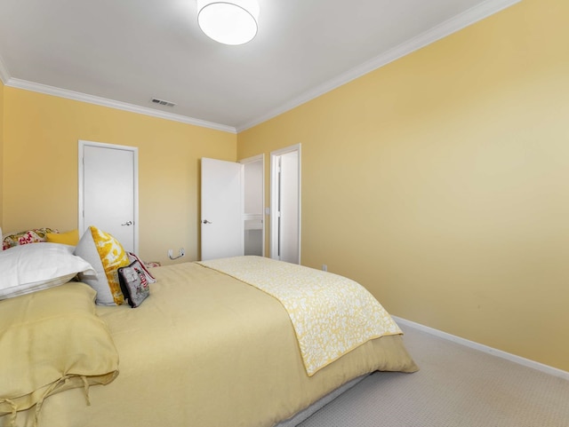 bedroom with baseboards, ornamental molding, light colored carpet, and visible vents