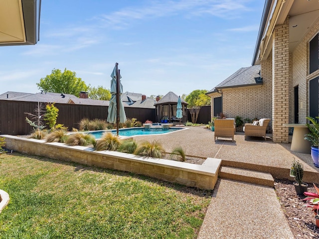 view of swimming pool featuring a lawn, a gazebo, a fenced in pool, a fenced backyard, and a patio