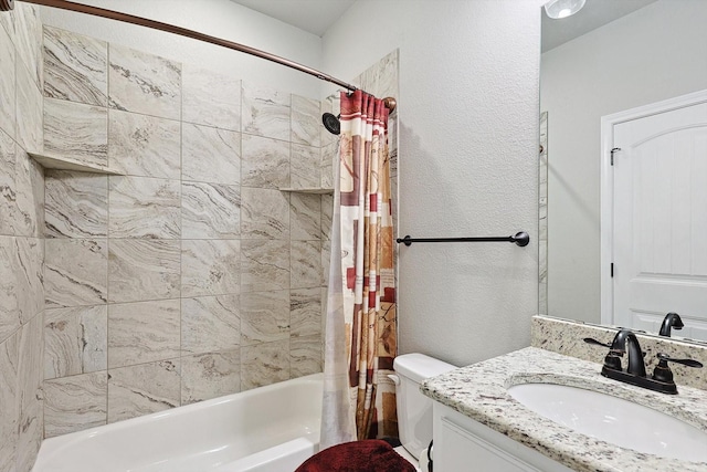 bathroom with a textured wall, shower / tub combo with curtain, toilet, and vanity