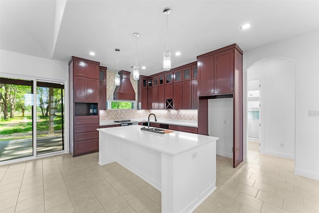 6048 Vz County Rd Unit 2120, Wills Point, TX 75169 - kitchen with tasteful backsplash, arched walkways, light countertops, reddish brown cabinets, and recessed lighting