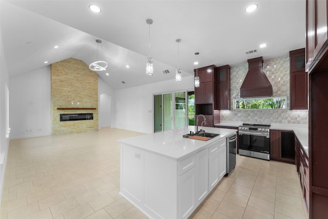 6048 Vz County Rd Unit 2120, Wills Point, TX 75169 - kitchen featuring appliances with stainless steel finishes, light countertops, a sink, custom range hood, and backsplash