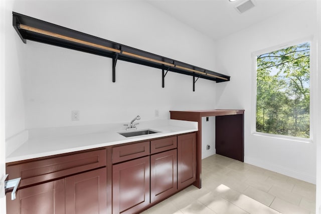 6048 Vz County Rd Unit 2120, Wills Point, TX 75169 - clothes washing area featuring a sink, light tile patterned floors, baseboards, and visible vents