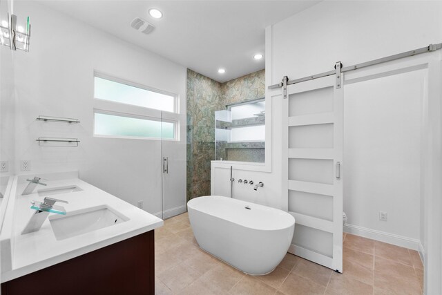 6048 Vz County Rd Unit 2120, Wills Point, TX 75169 - bathroom with a shower stall, a freestanding tub, a sink, and visible vents