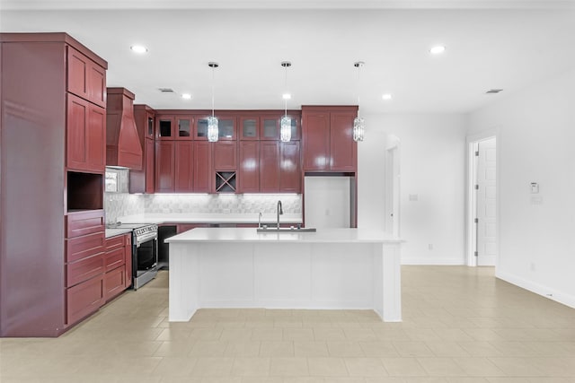 6048 Vz County Rd Unit 2120, Wills Point, TX 75169 - kitchen with built in refrigerator, stainless steel range with electric stovetop, custom exhaust hood, a sink, and reddish brown cabinets