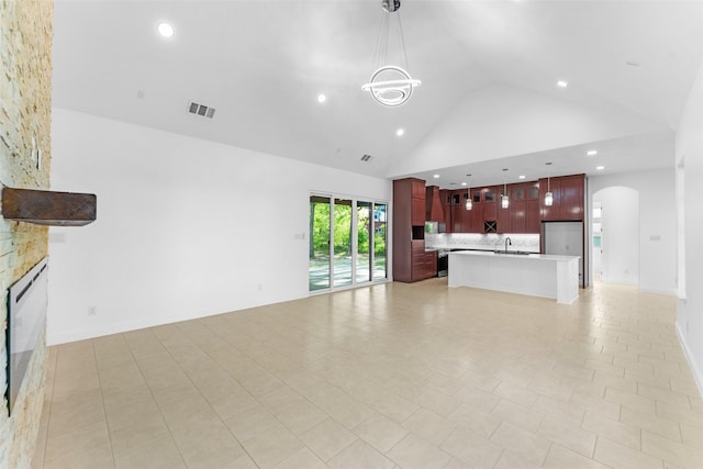 6048 Vz County Rd Unit 2120, Wills Point, TX 75169 - unfurnished living room with light tile patterned floors, high vaulted ceiling, visible vents, recessed lighting, and a sink
