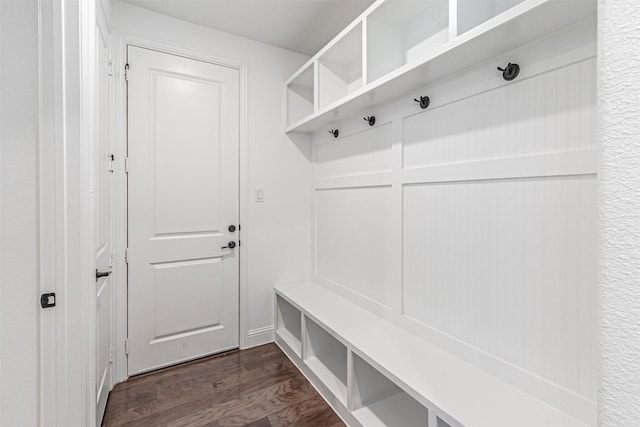 mudroom with dark wood-style floors