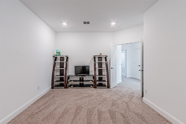 interior space featuring recessed lighting, carpet floors, baseboards, and visible vents