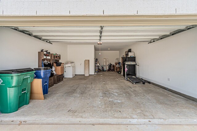 garage featuring baseboards