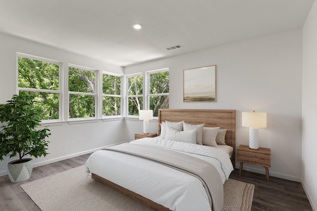 403 Tealridge Ct, Desoto, TX 75115 - bedroom featuring baseboards, wood finished floors, and recessed lighting