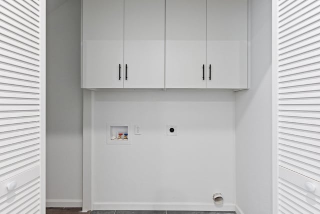 403 Tealridge Ct, Desoto, TX 75115 - laundry area with hookup for an electric dryer, cabinet space, washer hookup, and baseboards