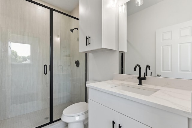 403 Tealridge Ct, Desoto, TX 75115 - bathroom featuring a stall shower, toilet, and vanity