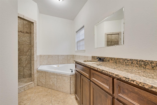 3234 Culver St, Dallas, TX 75223 - full bath with a bath, a tile shower, tile patterned floors, and vanity