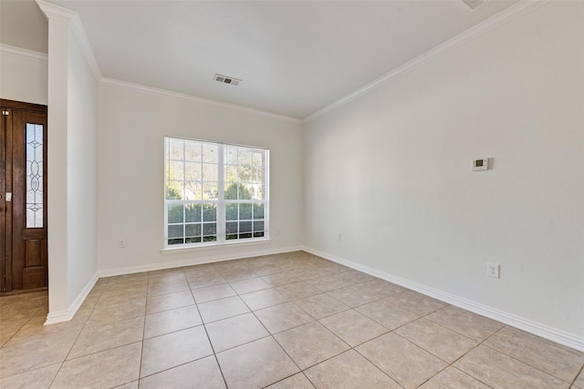 3234 Culver St, Dallas, TX 75223 - spare room with light tile patterned floors, crown molding, and baseboards