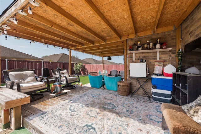 view of patio / terrace featuring a fenced backyard and washer / clothes dryer