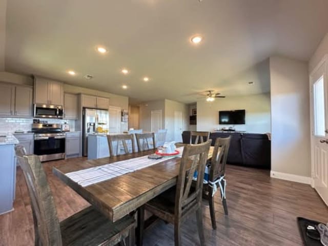 dining space with a ceiling fan, recessed lighting, baseboards, and dark wood finished floors
