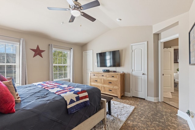 bedroom with a ceiling fan, baseboards, and lofted ceiling