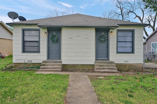1326 W Shepherd St, Denison, TX 75020 - bungalow-style home with entry steps, crawl space, roof with shingles, and a front lawn