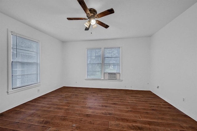 1326 W Shepherd St, Denison, TX 75020 - empty room with dark wood-type flooring, ceiling fan, and cooling unit