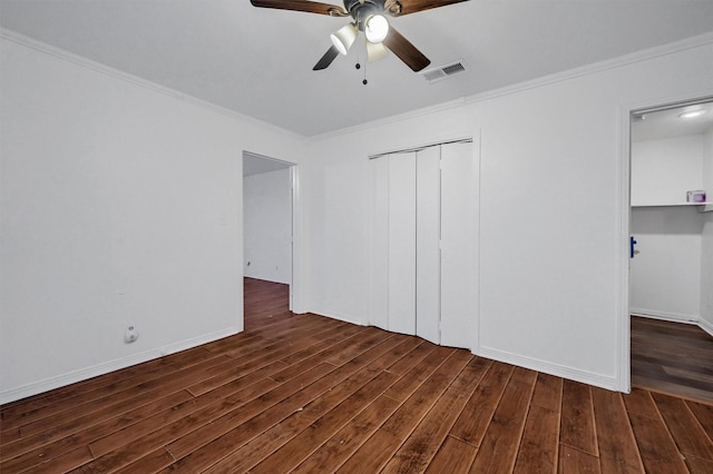 1326 W Shepherd St, Denison, TX 75020 - unfurnished bedroom with crown molding, dark wood-style floors, a closet, a ceiling fan, and baseboards