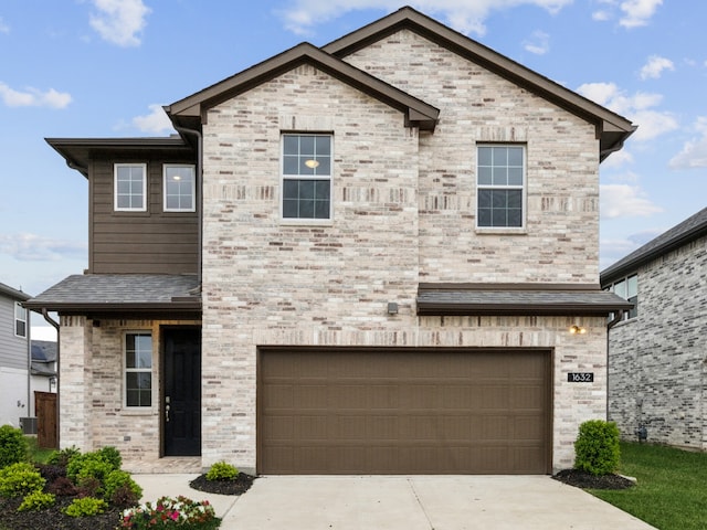 view of front facade with a garage, central air condition unit, concrete driveway, and brick siding