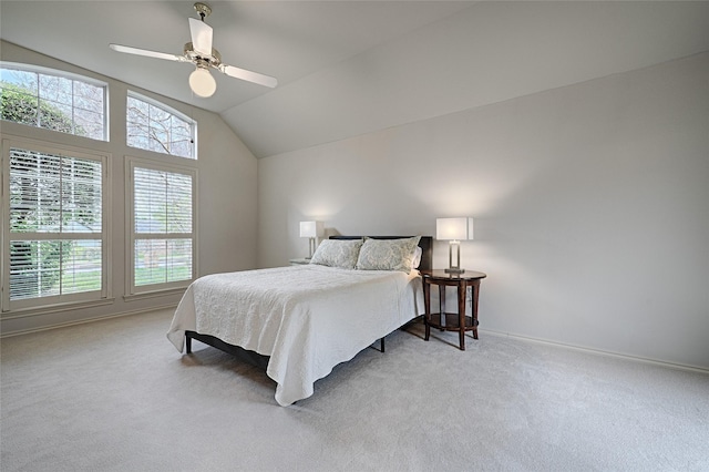 2215 Burgundy Dr, Carrollton, TX 75006 - bedroom featuring light carpet, ceiling fan, baseboards, and lofted ceiling
