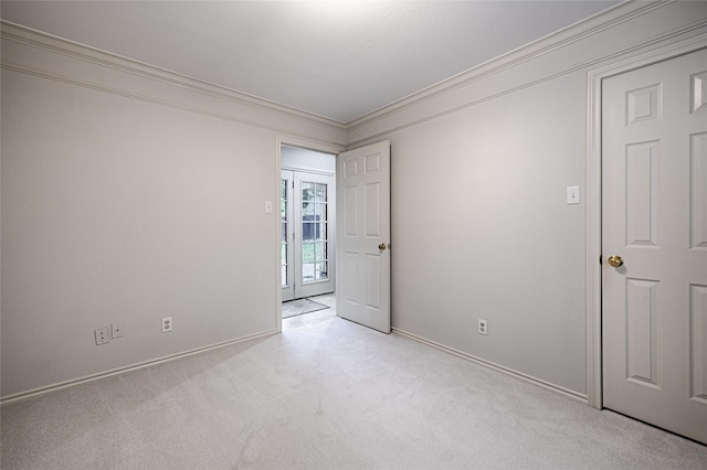 2215 Burgundy Dr, Carrollton, TX 75006 - carpeted empty room featuring crown molding and baseboards