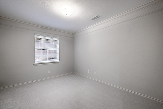 2215 Burgundy Dr, Carrollton, TX 75006 - spare room with ornamental molding, visible vents, carpet floors, and a textured ceiling