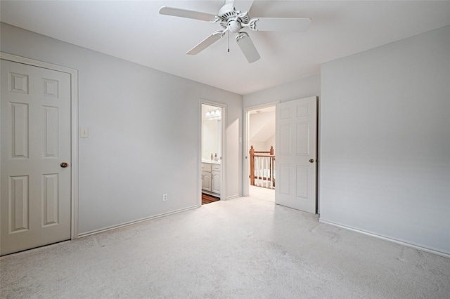 2215 Burgundy Dr, Carrollton, TX 75006 - unfurnished bedroom featuring carpet, ensuite bathroom, baseboards, and ceiling fan