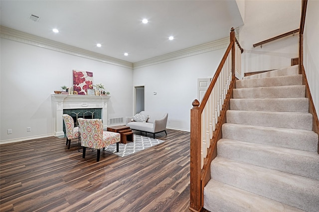 2215 Burgundy Dr, Carrollton, TX 75006 - living area featuring ornamental molding, recessed lighting, stairway, dark wood-type flooring, and visible vents