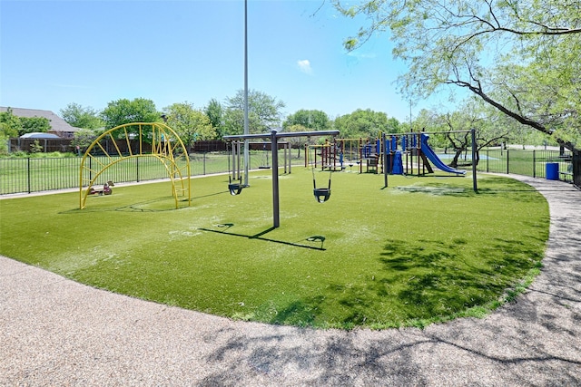 2215 Burgundy Dr, Carrollton, TX 75006 - community jungle gym with fence and a lawn