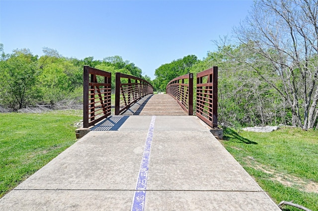 2215 Burgundy Dr, Carrollton, TX 75006 - view of gate featuring a lawn