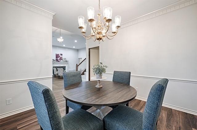 2215 Burgundy Dr, Carrollton, TX 75006 - dining room with ornamental molding, baseboards, a chandelier, and wood finished floors