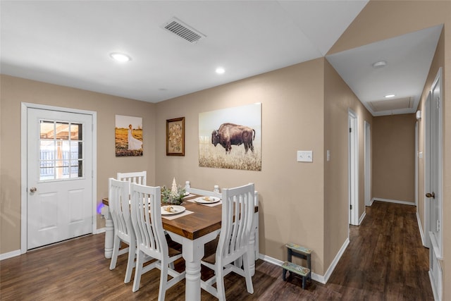 dining area with visible vents, baseboards, wood finished floors, recessed lighting, and attic access